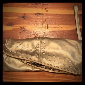 Charming Charlie’s gold clutch